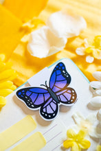 Load image into Gallery viewer, A delicate magnetic bookmark featuring a beautifully detailed purple butterfly with elegant, fluttering wings. This eco-friendly bookmark has a soft, hand-drawn style, perfect for adding a touch of nature’s beauty to your reading! 🦋📖✨