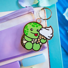 Load image into Gallery viewer, A keychain combining a turtle and ice cream design, crafted from cherry veneer wood, available at Belugabe