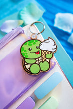 Load image into Gallery viewer, A keychain combining a turtle and ice cream design, crafted from cherry veneer wood, available at Belugabe