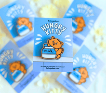 Load image into Gallery viewer,
A vibrant collection of wooden pins featuring adorable animal designs. The set includes a cheerful turtle with a bright shell, a cute cow with soft spots, a happy ducky with a tiny beak, and a playful frog mid-hop. There’s also a boba bear and boba panda, each holding a cup of boba tea with tapioca pearls, a reading panda (“Pu”) engrossed in a book, and a hungry kitty with a charmingly mischievous expression. Each pin is detailed with colorful accents and natural wood grain, adding personality and whimsy t