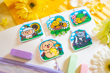 Load image into Gallery viewer, The Special Spring Magnetic Bookmark Set is a collection of five charming bookmarks, each featuring unique spring-themed designs. These bookmarks are double-sided, with a protective laminate on the front that provides a glossy finish. Each bookmark measures approximately 2.4 inches on its longest side and contains a strong rectangular magnet inside to securely hold your page without causing damage. Please note that colors may vary slightly from the pictures due to lighting and other factors. This set includ