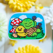 Load image into Gallery viewer, A glossy sticker featuring a cute turtle lounging with a relaxed expression. The turtle has a smooth, rounded shell and a peaceful vibe, giving off a chill and carefree energy.
Let me know if you want any changes! 😊🐢✨