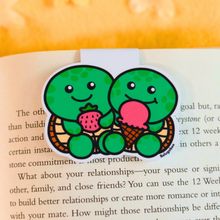 Load image into Gallery viewer, A magnetic bookmark featuring a turtle design, printed on high gloss cardstock, available
