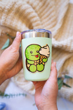 Load image into Gallery viewer, An eco-friendly bamboo sticker featuring a turtle with a strawberry-patterned shell.