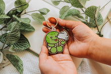 Load image into Gallery viewer, A keychain combining a turtle and ice cream design, crafted from cherry veneer wood, available at Belugabe