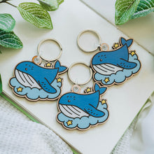 Load image into Gallery viewer, Belugabee Dreamy Whale Wooden Keychains: Trio of adorable keychains crafted from responsibly sourced cherry veneer wood, featuring dreamy whales in vibrant colors. Elevate your accessories with this eco-friendly ensemble. 🐋🔑 #DreamyWhaleKeychain #WoodenAccessories #CharmingEnsemble