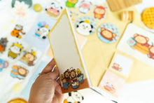 Load image into Gallery viewer, A delightful memo pad featuring a cute monkey enjoying breakfast at a cozy café. With playful illustrations and vibrant colors, this memo pad adds a fun touch to your desk for jotting down notes or reminders. 🍌🍳☕🐒