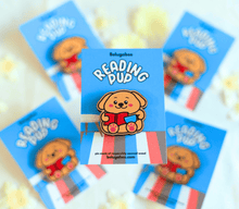 Load image into Gallery viewer,
A vibrant collection of wooden pins featuring adorable animal designs. The set includes a cheerful turtle with a bright shell, a cute cow with soft spots, a happy ducky with a tiny beak, and a playful frog mid-hop. There’s also a boba bear and boba panda, each holding a cup of boba tea with tapioca pearls, a reading panda (“Pu”) engrossed in a book, and a hungry kitty with a charmingly mischievous expression. Each pin is detailed with colorful accents and natural wood grain, adding personality and whimsy t