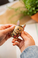 Load image into Gallery viewer, Belugabee Bamboo Sticker: Demonstrating flexibility and durability – Bunny and Carrot design showcased in a bent position. Elevate your style with this eco-friendly 3x3-inch sticker. 🐰🥕 #BambooSticker #FlexibilityAndDurability #BunnyAndCarrot