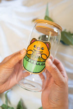 Load image into Gallery viewer, Kitty Cat Ramen Bamboo Sticker gracefully adorning a glass cup, adding feline charm to your drinkware. 🐱🍜 #BambooStickerOnGlassCup #WhimsicalFelineArt
