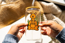 Load image into Gallery viewer, A heartwarming bamboo sticker featuring a kangaroo mother and her baby, enhancing the charm as it graces a glass cup. 🦘💚 #KangarooSticker #BambooArt #WildlifeCharm