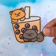 Load image into Gallery viewer, Kittens Boba Bamboo Sticker Alt Text: Playful kittens sipping boba, captured in this charming bamboo sticker. Perfect for adding a touch of feline cuteness to any surface! 🐾🥤 #KittensBobaSticker #BambooArt #CuteKittens