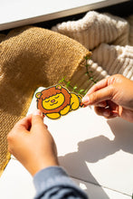Load image into Gallery viewer, A lion bamboo sticker displaying the king of the jungle's majestic demeanor, adding a touch of wildlife royalty to your belongings. 🦁🌿 #LionBambooSticker #WildlifeArt #MajesticLion