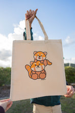 Load image into Gallery viewer, A heartwarming design featuring a loving red panda mom cuddling her adorable baby, surrounded by soft nature-inspired details. Printed on a sturdy, eco-friendly tote bag, perfect for carrying books, groceries, and everyday essentials. A must-have for red panda lovers!