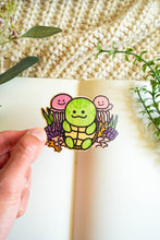 Load image into Gallery viewer, This set includes a green turtle cartoon character with a red tongue sticking out, holding a waffle cone ice cream with a white swirl on top. The adhesive is very strong, so make sure you stick this sticker onto a place where you'd want it for a long time