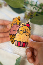 Load image into Gallery viewer, his set includes stickers featuring hamsters with various desserts, such as cupcakes and ice cream cones. Each sticker is made from sustainable bamboo and is eco-friendly.