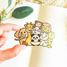 Load image into Gallery viewer, A Zoo Animals Bamboo Sticker is an eco-friendly decorative item featuring illustrations of various zoo animals, such as pandas, elephants, and giraffes, printed on sustainable bamboo material. These stickers are designed to be durable and versatile, suitable for application on items like hydro flasks, journals, and tote bags. The strong adhesive ensures they stay securely in place over time.