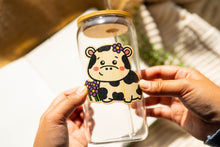 Load image into Gallery viewer, "Belugabee Bamboo Wood Sticker: Happy cow with a bright smile amidst lovely purple flowers, adorning a glass cup. Elevate your style with this eco-friendly 3x3-inch sticker. 🐮🌸 #BambooWoodSticker #HappyCowAndFlowers #GlassCupDecor