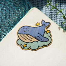 Load image into Gallery viewer, Belugabee Dreamy Whale Bamboo Sticker: Charming design featuring dreamy whales in shades of blue, crafted on eco-friendly bamboo. Elevate your style with this adorable 3x3-inch sticker. 🐋✨ #BambooSticker #DreamyWhale #CuteOceanArt