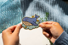 Load image into Gallery viewer, Belugabee Dreamy Whale Bamboo Sticker: Charming design featuring dreamy whales in shades of blue, crafted on eco-friendly bamboo. Elevate your style with this adorable 3x3-inch sticker. 🐋✨ #BambooSticker #DreamyWhale #CuteOceanArt