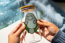 Load image into Gallery viewer, Enjoy the tranquil presence of a manatee amidst colorful coral, elegantly displayed on your glass cup. 🌊💙 #ManateeSticker #BambooArt #OceanVibes