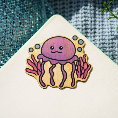 Jellyfish Bamboo Sticker Alt Text: A mesmerizing bamboo sticker featuring a graceful purple jellyfish, surrounded by a vibrant coral reef and playful bubbles, adding a touch of underwater enchantment to your belongings. 🌊💜🐚 #BambooSticker #JellyfishArt #UnderwaterMagic