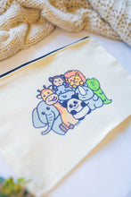 Load image into Gallery viewer, Colorful zoo animals pencil case featuring a vibrant design with playful illustrations of lions, elephants, giraffes, and other zoo animals, perfect for keeping your stationery organized in style