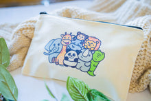 Load image into Gallery viewer, Colorful zoo animals pencil case featuring a vibrant design with playful illustrations of lions, elephants, giraffes, and other zoo animals, perfect for keeping your stationery organized in style