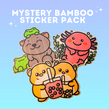 Load image into Gallery viewer, A surprise collection of eco-friendly bamboo stickers featuring adorable animals, whimsical creatures, and delightful designs! Each pack contains a unique mix, making it a fun mystery to unwrap. Perfect for decorating water bottles, laptops, journals, and more!"