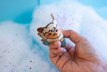 Load image into Gallery viewer, Belugabee Dreamy Sheep Bamboo Sticker: Demonstrating flexibility as the sticker featuring a dreamy sheep on clouds with two stars is gently bent. Elevate your style with this charming and eco-friendly 3x3-inch bamboo sticker. 🐑✨ #BambooSticker #FlexibilityAndDurability #DreamySheep