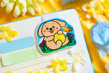 Load image into Gallery viewer, A lovable magnetic bookmark featuring an adorable golden retriever puppy with a happy, playful expression. This eco-friendly bookmark has a cute, hand-drawn style, perfect for marking your favorite pages with a touch of puppy love! 🐶📖✨
