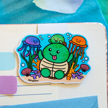 Load image into Gallery viewer, These  Turtle bookmarks not only help you keep your place in your reading material but also add a delightful touch of marine life to your reading experience.
