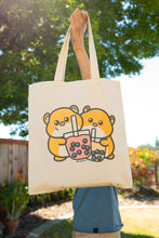 Load image into Gallery viewer, Belugabee Hamster Boba Tote Bag Alt Text: A whimsical tote featuring adorable hamsters enjoying boba drinks. Crafted with care on eco-friendly material, this bag blends cuteness with environmental consciousness. 🐹🥤👜 #BobaTote #CuteEcoFashion #HamsterDesign
