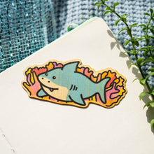 Load image into Gallery viewer, Belugabee Bamboo Sticker: Majestic great white shark design, crafted on eco-friendly bamboo, with vibrant coral reefs in the backdrop. Elevate your style with this captivating 3x3-inch sticker. 🦈🌊🌿 #BambooSticker #GreatWhiteSharkDesign #CoralReefArt
