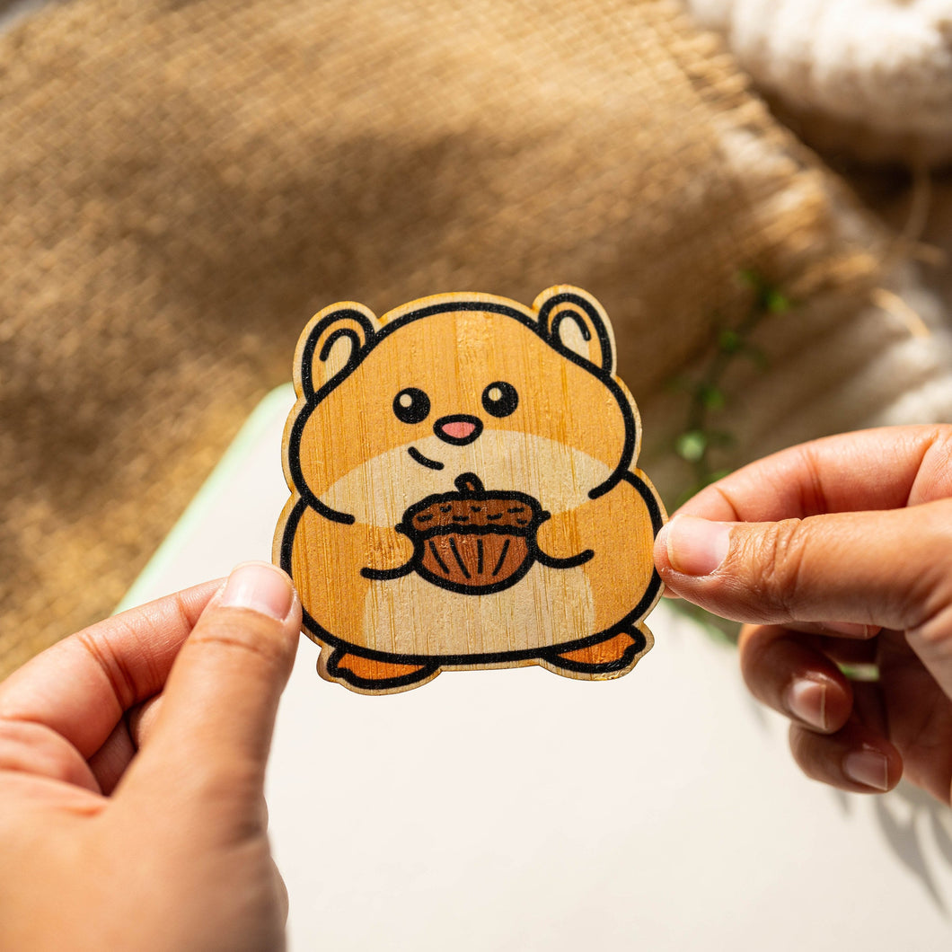 Belugabee Bamboo Sticker: Adorable hamster in acorn design, crafted on eco-friendly bamboo. Elevate your style with this charming 3x3-inch sticker. 🐹🌿 #BambooSticker #HamsterAcornDesign #CuteDecor