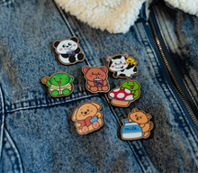 Load image into Gallery viewer, A cute wooden pin featuring an adorable kitty with big eyes, eagerly looking at a bowl of food. This eco-friendly pin has a playful, hand-carved design, perfect for adding a touch of feline charm to your bag or jacket! 🐱🍽️✨
