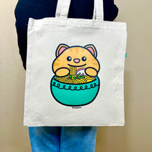 Load image into Gallery viewer, Ecofriendly tote bag with Yellow Cat eating Ramen out of blue Bowl, Brown Tote, Front Side
