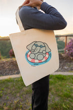 Load image into Gallery viewer, Illustration of an elephant swimming underwater on a durable tote bag.
