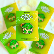 Load image into Gallery viewer, A selection of unique or custom, handmade wooden turtle pins, perfect for adding a touch of nature to your accessorie
