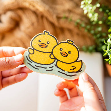 Belugabee Bamboo Sticker: Adorable scene of two duckies swimming side by side, captured on eco-friendly bamboo. Elevate your style with this charming 3x3-inch sticker. 🦆🌿 #BambooSticker #Duckies #CuteWildlife