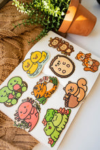 Load image into Gallery viewer, Belugabee Bamboo Stickers Alt Text: A delightful ensemble of nine unique bamboo designs adorning a notebook cover, offering a touch of eco-friendly charm to your stationery collection. 🌿✨ #BambooStickers #EcoFriendlyArt #AdorableDesigns
