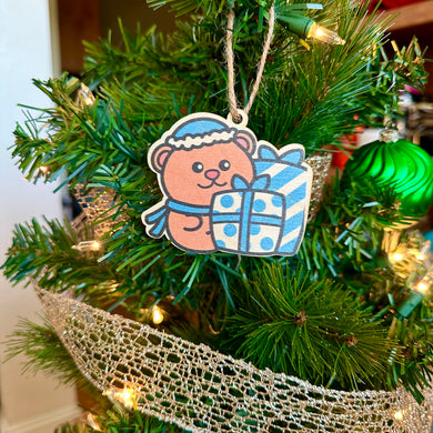 Blue Bear Wooden Holiday Ornament hanging on Christmas Tree