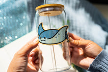 Load image into Gallery viewer, The Stingray Bamboo Sticker is an eco-friendly accessory featuring a charming illustration of a stingray. Crafted from 100% sustainable bamboo, this sticker measures approximately 3x3 inches. 
