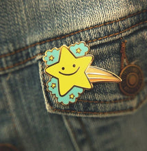 Load image into Gallery viewer, Hopeful Star Enamel Pin Alt Text: Attaching the radiant Hopeful Star Enamel Pin to denim jeans, a stylish way to showcase positivity and inspiration in your daily attire. 🌟👖 #EnamelPinFashion #HopefulStar #DenimStyle
