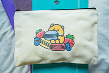 Load image into Gallery viewer, Hungry Hamster Pencil Pouch Alt Text: Adorable pencil pouch featuring a hungry hamster munching on a macaroon, surrounded by sweet treats like macaroons and berries, a whimsical and delightful design to brighten up your stationery collection. 🐹🍬✏️ #PencilPouch #CuteHamster #MacaroonDesign
