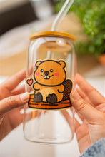 Load image into Gallery viewer, Bamboo Sticker Beaver on a Glass Cup, Bamboo wood sticker of beaver placed on a cup to show the adhesive 

