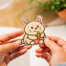 Load image into Gallery viewer, Belugabee Bamboo Sticker: Charming bunny with carrot design in white and orange. Elevate your style with this eco-friendly 3x3-inch sticker. 🐰🥕 #BambooSticker #BunnyAndCarrot
