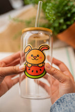Load image into Gallery viewer, Belugabee Bamboo Sticker: Adorable Bunny and Watermelon design adorning a glass cup. Elevate your style with this eco-friendly 3x3-inch sticker. 🐰🍉 #BambooSticker #BunnyAndWatermelon #GlassCupDecor
