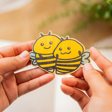 Load image into Gallery viewer, Bee Buddies Bamboo Sticker, Two Bees next to each other, Yellow and Black with wings
