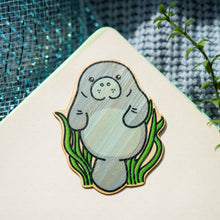 Load image into Gallery viewer, A peaceful manatee surrounded by vibrant coral, adding a serene touch to your belongings. 🌊💙 #ManateeSticker #BambooArt #OceanVibes
